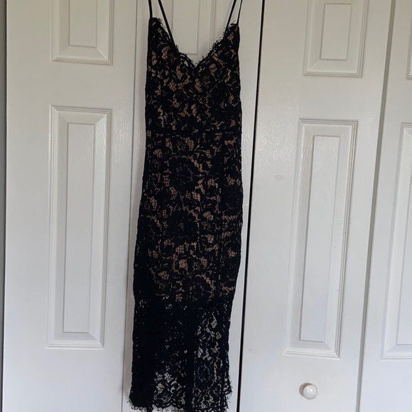 lace black dress worn to a wedding.